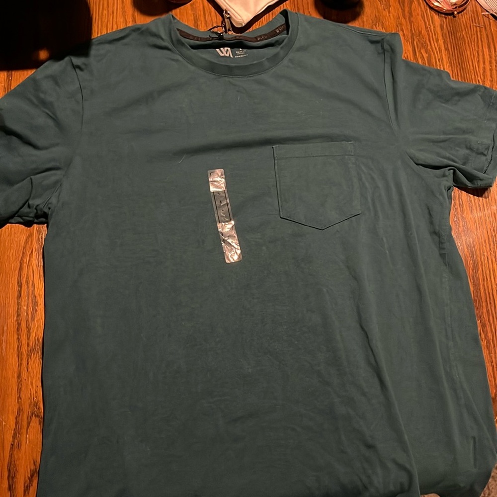 Never worn - men’s green T-shirt